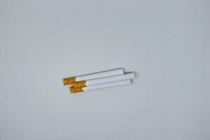 Indonesian kretek cigarettes with white isolation photo