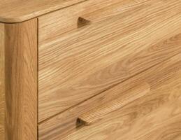 Drawers close view photo, wooden furniture background photo