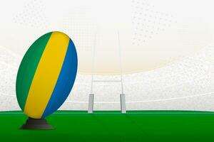 Gabón nacional equipo rugby pelota en rugby estadio y objetivo publicaciones, preparando para un multa o gratis patada. vector