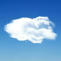 Single white fluffy cloud isolated over blue background photo