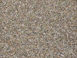 Pebble stones background, natural pattern surface photo