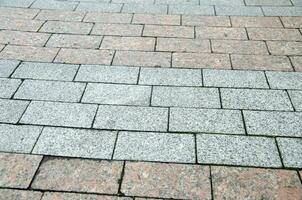 Bricks and stones city pavement pattern photo