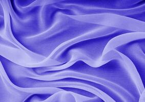 Deep blue glossy cloth texture background. Natural textile material photo, pattern cover photo