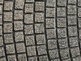 Brick wall pattern close view background, gray bricks surface photo