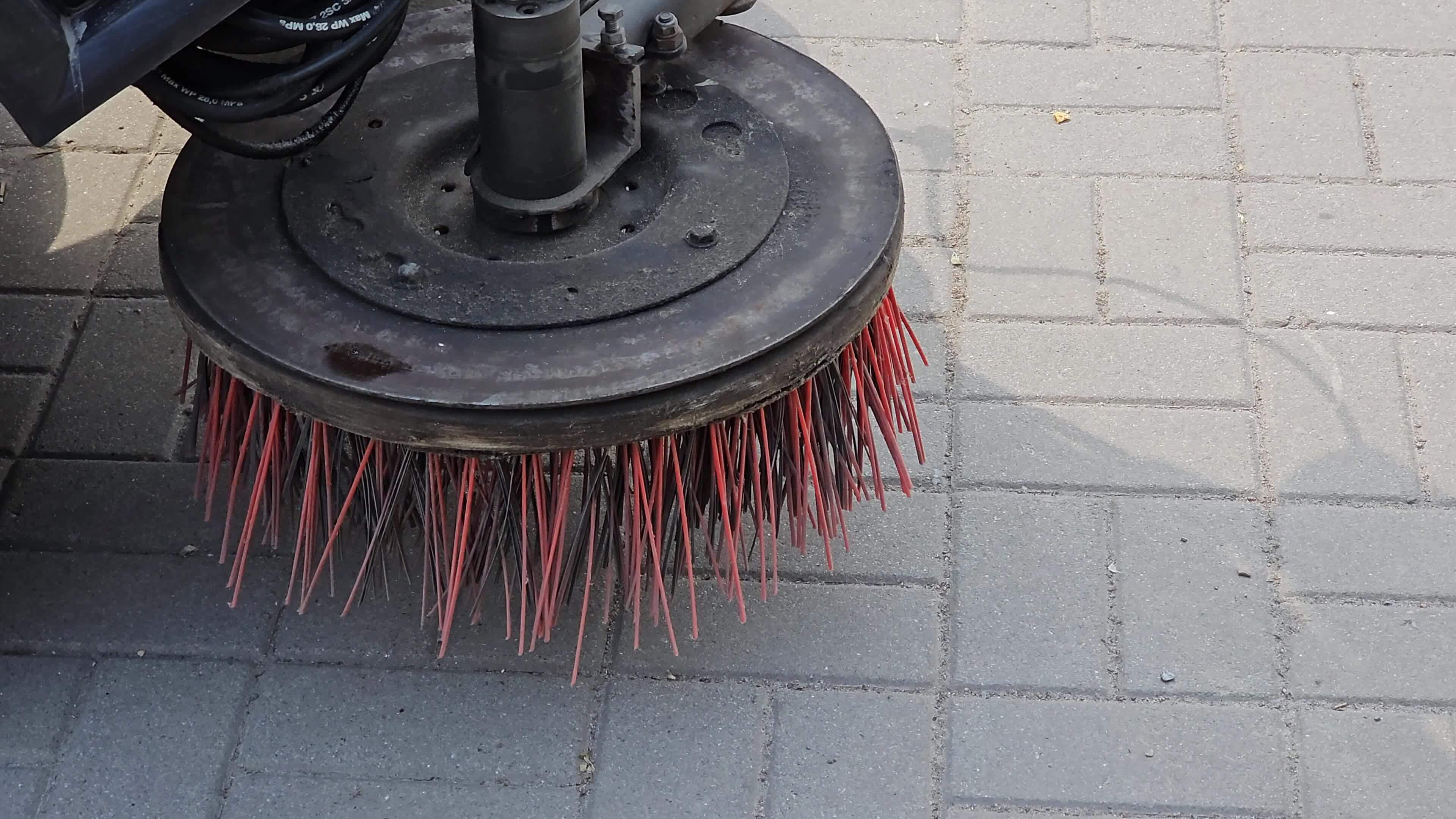 Besen von Straße Kehrmaschine Auto Maschine Nahansicht. Konzept