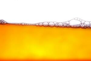 beautiful yellow-orange water waves and also beautiful bubbles, white background photo