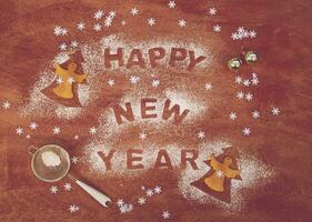 contento nuevo año texto en un marrón antecedentes foto
