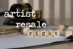 artist resell right word on wooden cube photo