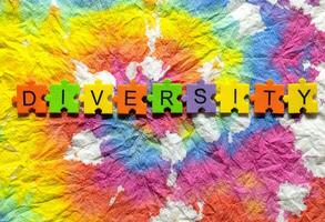 diversity word on colorful tie dye background photo