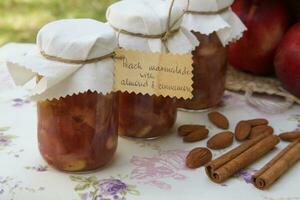 apple and cinnamon jam in jars photo