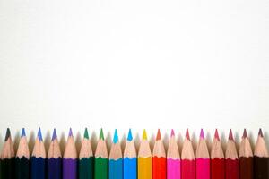 Colorful crayons in line with copy space photo