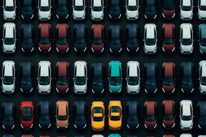 Top view of a row of cars on a dark background photo