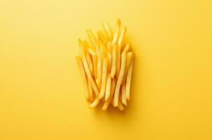 Minimalistic french fries on a yellow background. Generative AI photo