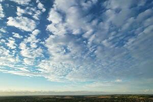 High Angle Drone's Camera Panoramic View of Dramatic Clouds and Sky over the Luton City of England UK, photo