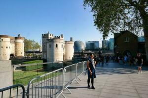 Most Beautiful Image of International Community Tourist People are Visiting Tower Bridge and River Thames at Central London Capital City of England Great Britain UK on Sunny Day of June 4th, 2023 photo