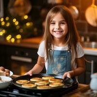 A beautiful girl bakes cupcakes with in a kitchen. photo