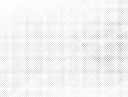 Abstract halftone background and grunge texture fade dotted gradient on white background. Free Vector