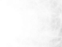 Abstract halftone background and grunge texture fade dotted gradient on white background. Free Vector