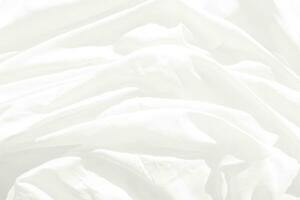 Top view Abstract White cloth background with soft waves.Wave and curve overlapping with different shadow of color,white fabric, crumpled fabric. photo