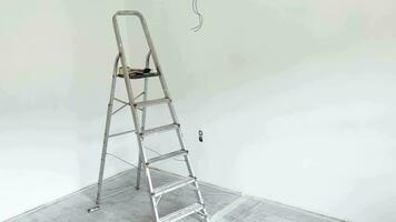 Construction ladder in a white room that is being renovated. video