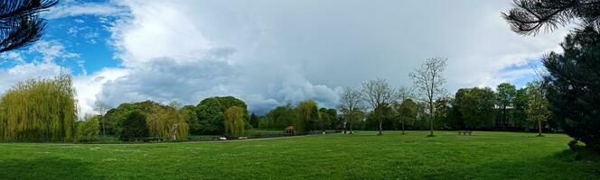 Low Angle Wide Panoramic View of Wardown Museum Public Park. The Wardown Public Park is Located Near to Central Luton City of England, Captured on May 5th, 2023 photo