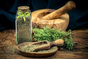 dried and fresh Thymus vulgaris delicious kitchen herbs photo