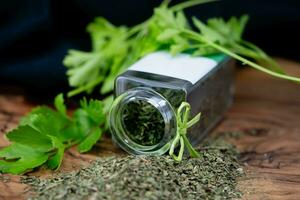 Fresh green parsley or dried and rubbed parsley Petroselinum crispum photo