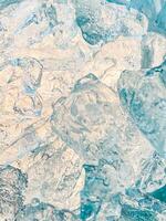 icecubes background,icecubes texture,icecubes wallpaper,ice helps to feel refreshed and cool water from the icecubes helps the water refresh your life and feel good.ice drinks for refreshment business photo