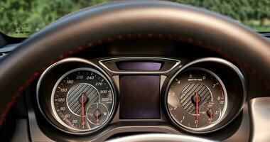 Sport car speedometer and sensors on a control panel background, modern car elements close view, driving a car photo