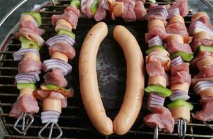 Tasty sausages with shashlik meal photo