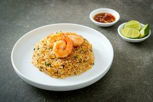 fried shrimps fried rice on plate photo