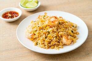 fried shrimps fried rice on plate photo