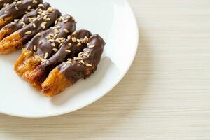 banana chocolate coating or banana dipped chocolate photo