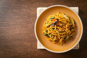 stir-fried yakisoba noodles with vegetable in vegan style photo