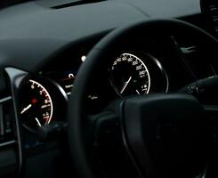 Car steering wheel background,  car elements close view photo