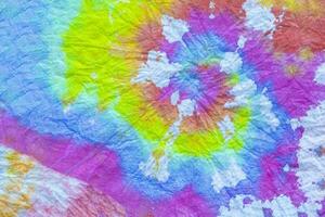 a colorful tie dye fabric with a white background photo