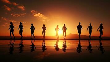 Athletic figures against sunset. silhouette concept photo