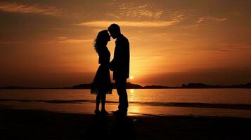 Young couple passionately kissing on a deserted shoreline. silhouette concept photo