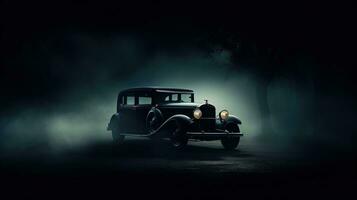 Selective focus on dark background showcasing a vintage car silhouette with glowing lights in low light photo