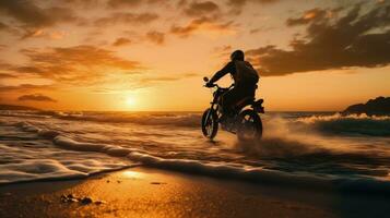 Silhouette of biker on beach during sunset photo