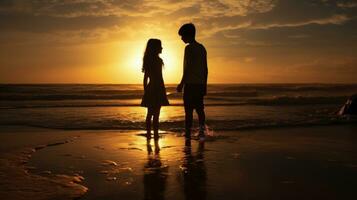 Boy and girl at sandy shore posing. silhouette concept photo