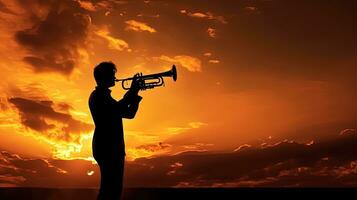 trompeta jugando en silueta foto