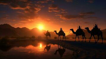 Riders on camels during sunset. silhouette concept photo