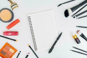 top view of makeup cosmetics set professional makeup tools. on a White background photo