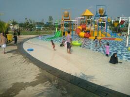 Water boom Swimming Pool in the morning under the blue sky photo