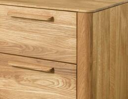 Drawers close view photo, wooden furniture background photo