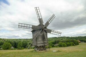 Old windmill and beautiful landscape photo