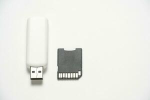 usb flash drive and card reader on a white background. photo