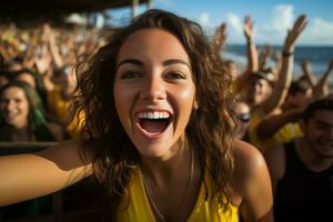 Brazilian beach soccer fans celebrating a victory photo