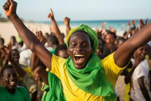 senegalés playa fútbol aficionados celebrando un victoria foto